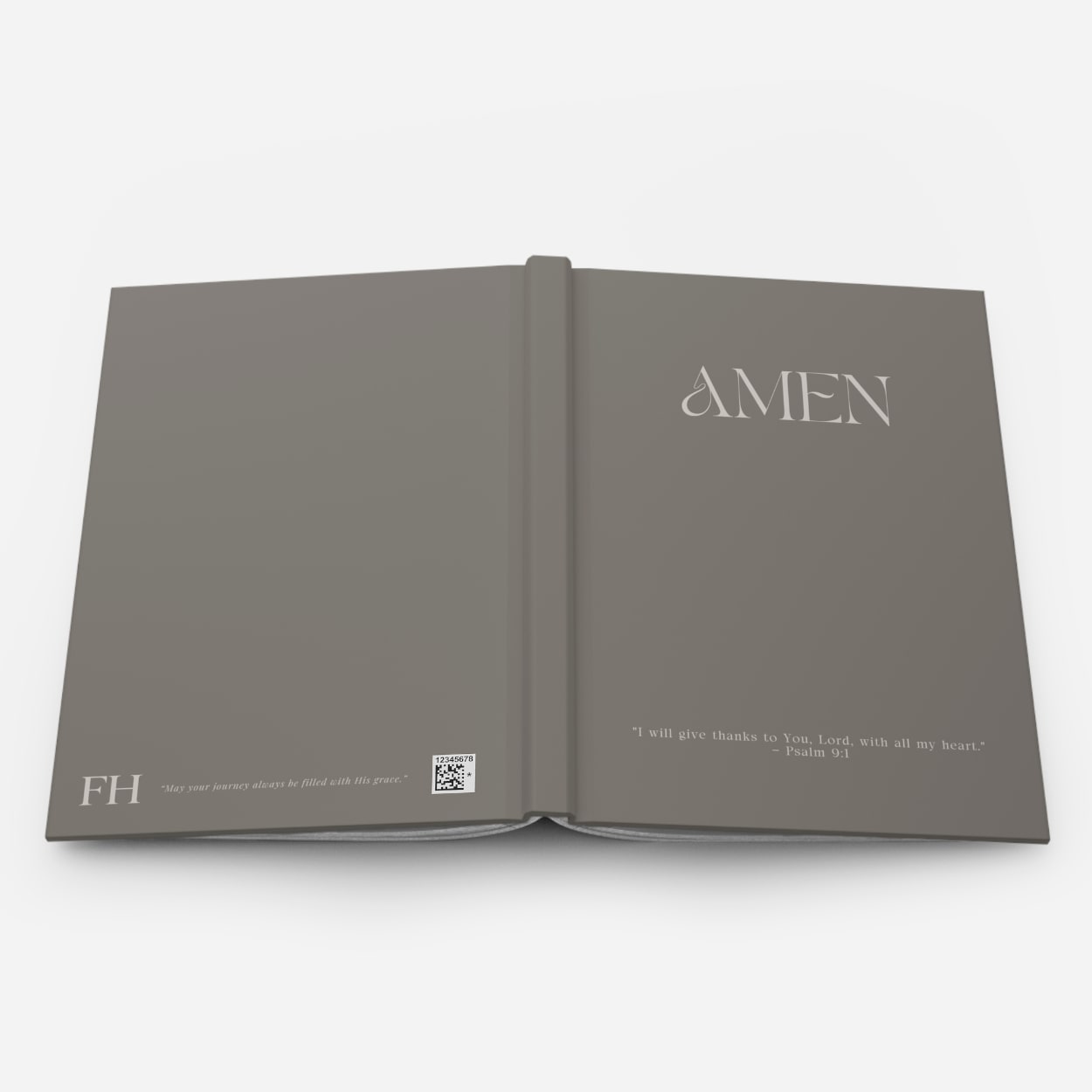 Outside view of open moss gray AMEN journal, revealing flexible binding and high-quality hardcover.