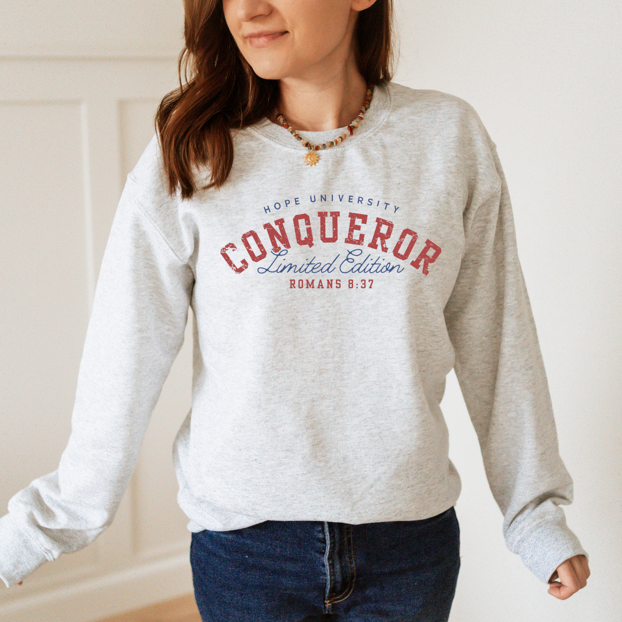 Christian College-Style Sweatshirt – More Than Conquerors Design