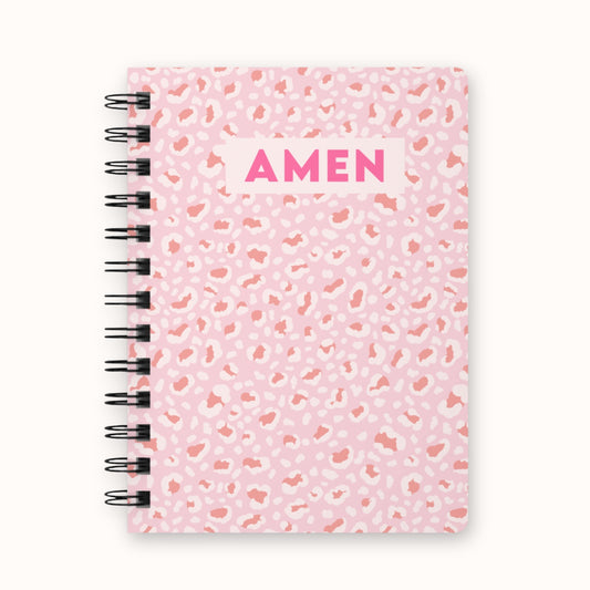 Pink leopard print spiral notebook with 'Amen' text on front cover and Faithful Hearts Co branding