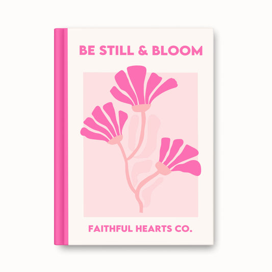 Be Still & Bloom journal showing hot pink spine with minimalist floral design on cream background and Faithful Hearts Co. branding