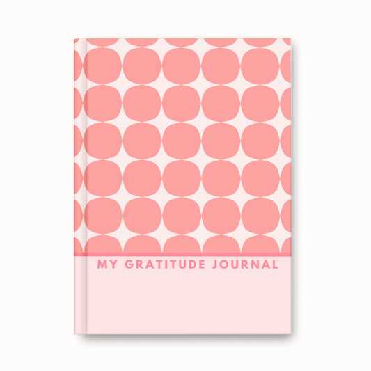 Blush pink patterned hardback gratitude journal with retro circles branded by Faithful Hearts Co.