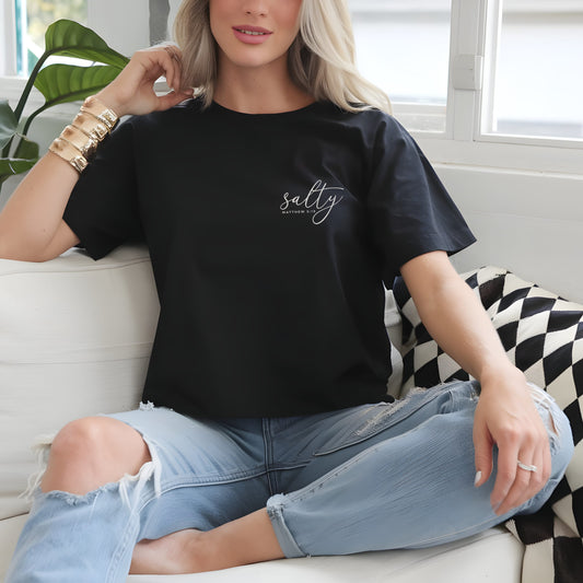 Women’s black Christian T-shirt with "Salty – Matthew 5:13" minimalist design