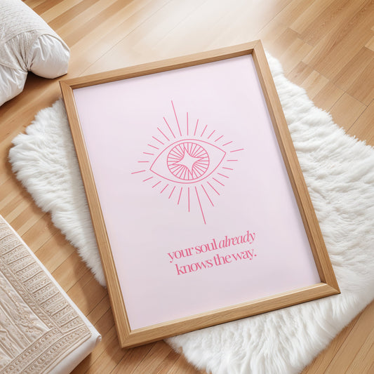 Your soul already knows the way spiritual wall art print with coral pink mystical eye illustration featuring sunburst rays and cross symbol on soft blush pink background, feminine faith-based intuition decor