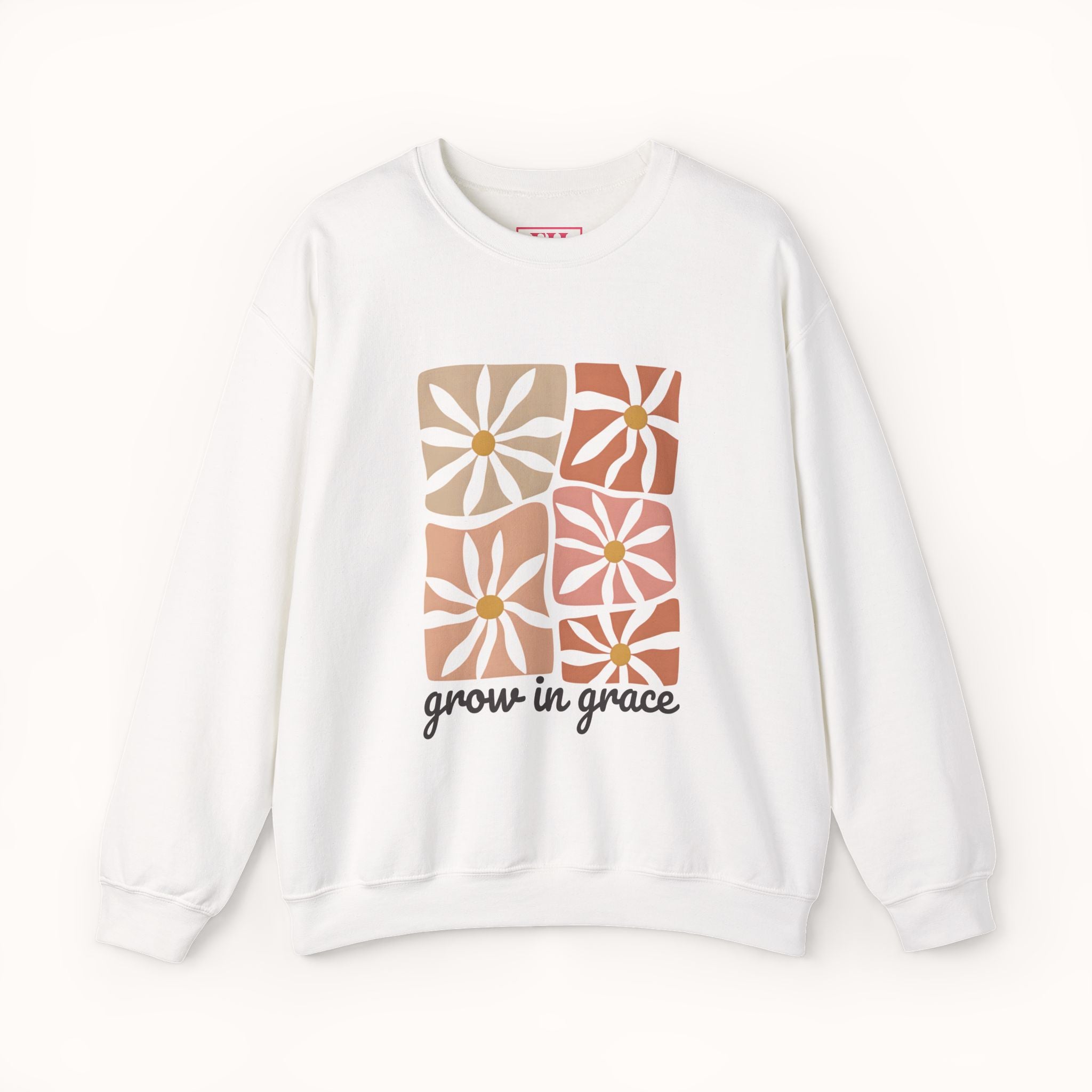 White sweatshirt with floral design and 'grow in grace' text on a white background