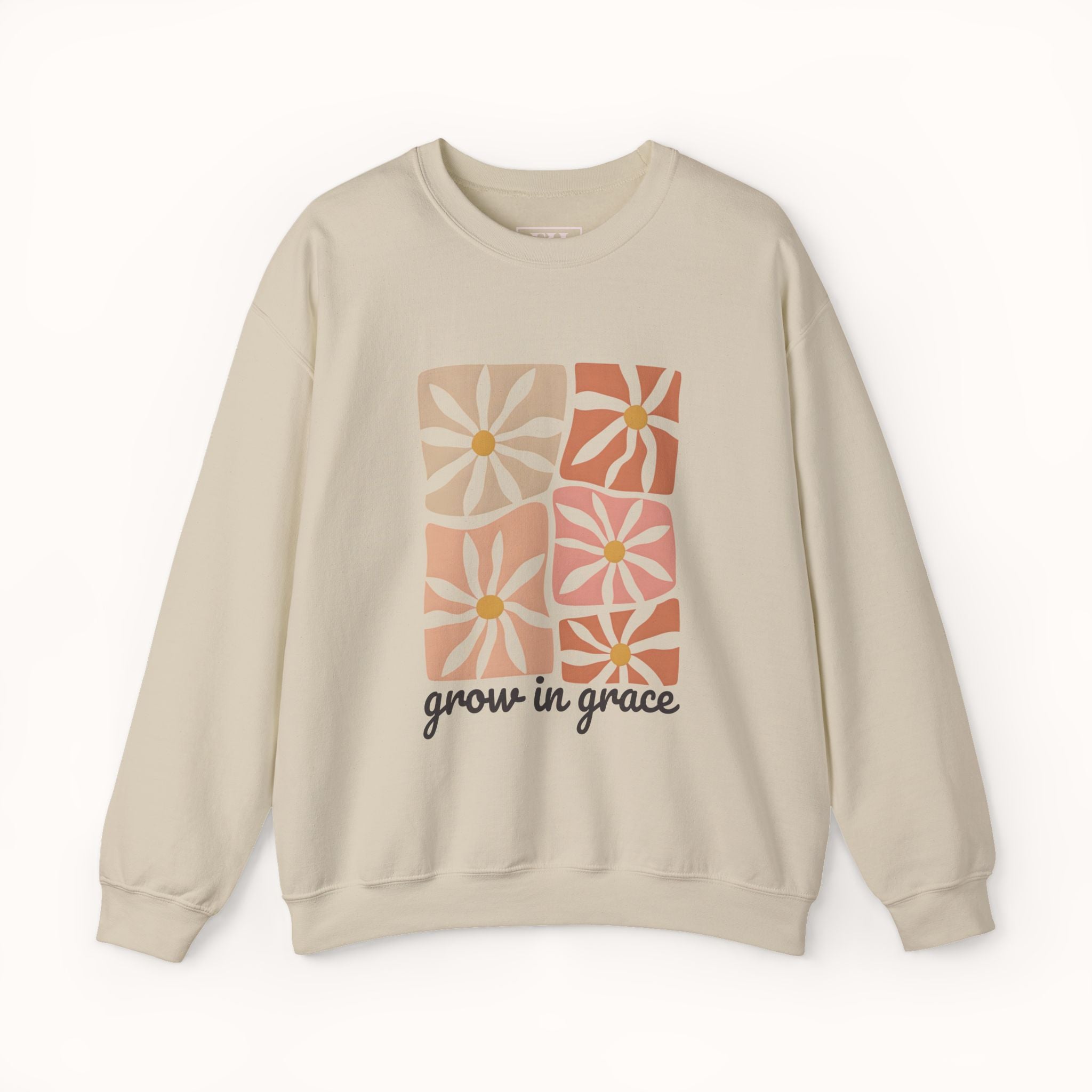 Beige sweatshirt with floral design and 'grow in grace' text on a white background