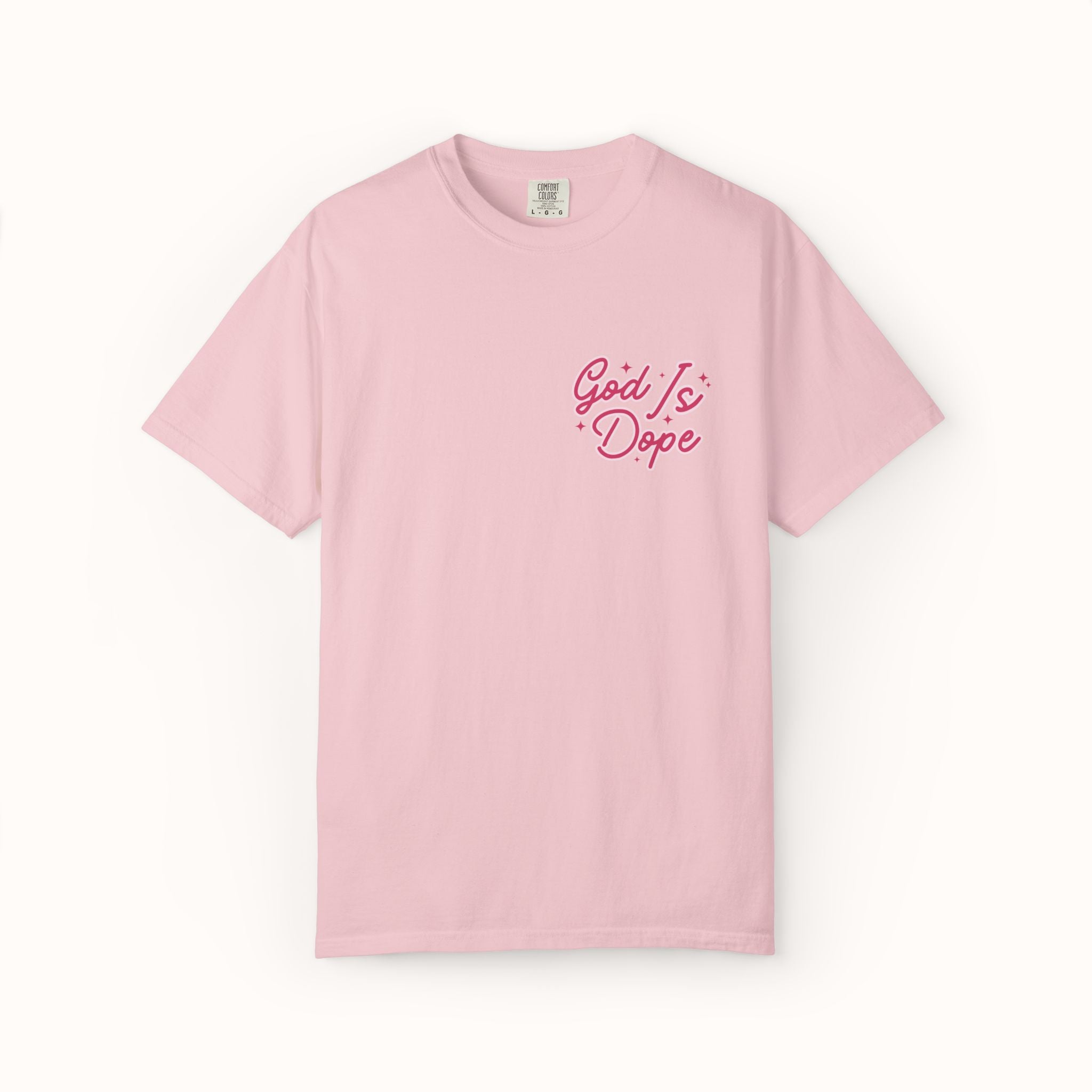 Pink t-shirt with 'God Is Dope' text on a white background