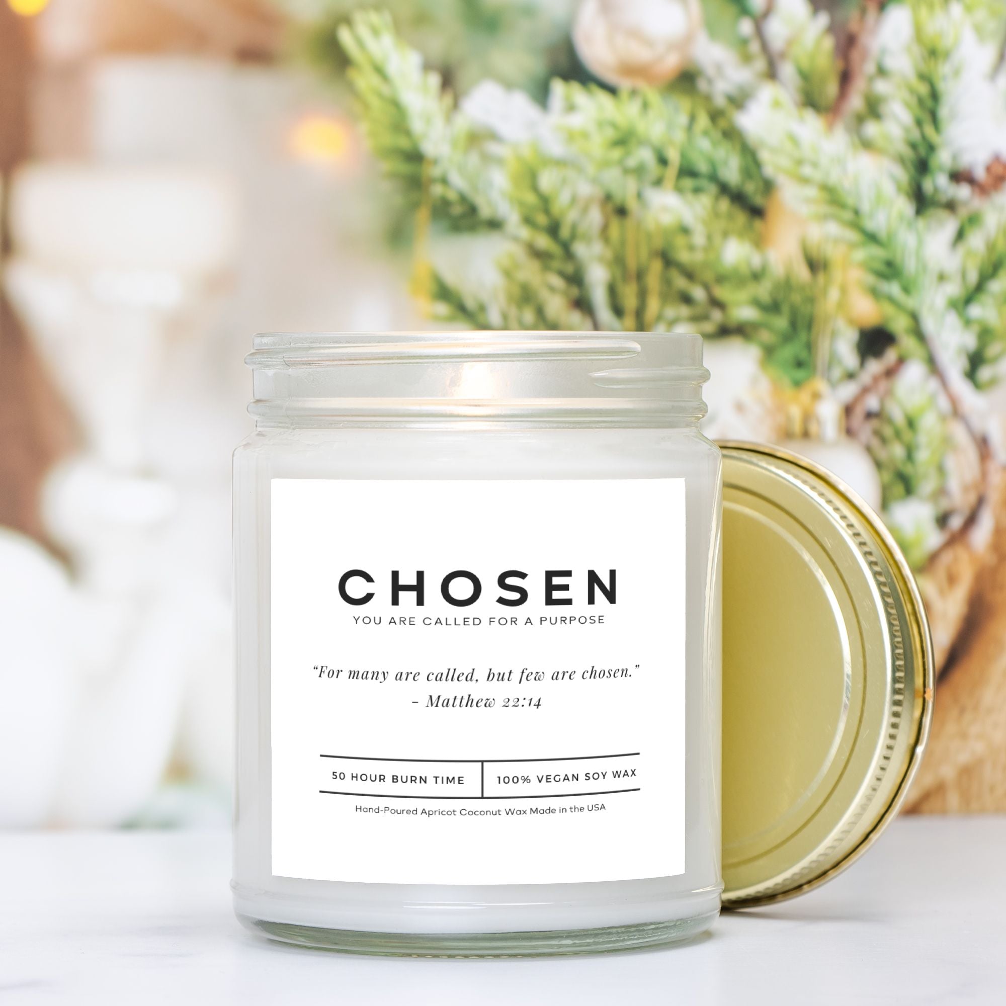 Minimalist clear jar soy candle with a Bible verse label, perfect for Christian home decor.