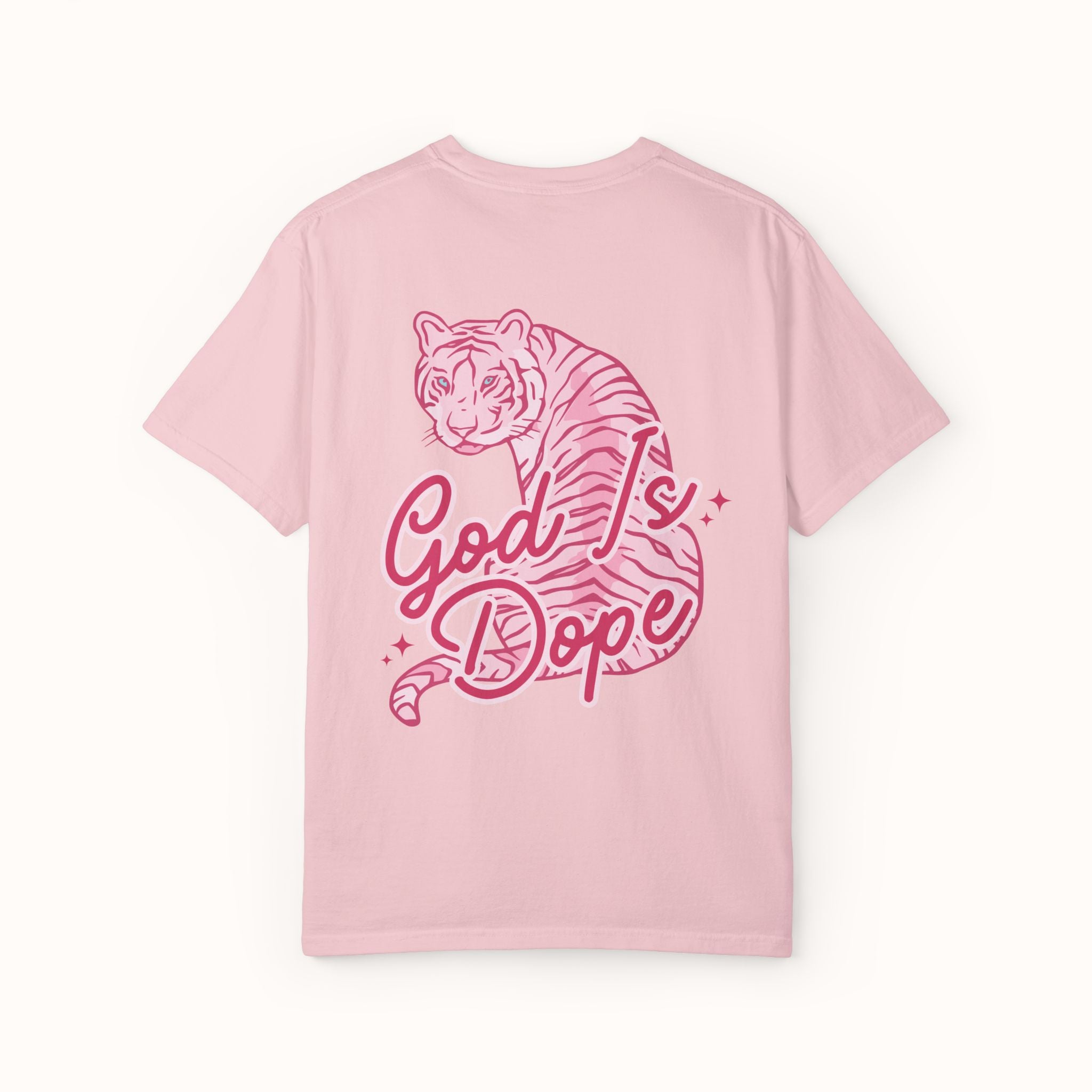 Pink t-shirt with a tiger graphic and 'God is Dope' text on a white background