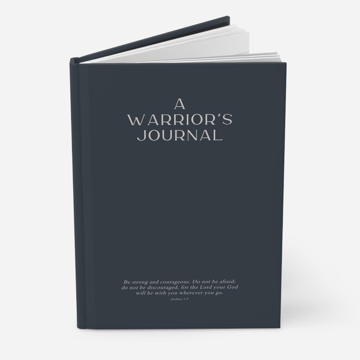 Navy blue warrior's journal standing upright, highlighting strong cover profile against neutral background