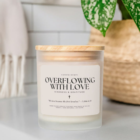 Luxury faith-inspired candle with Bible verse and soft pink wood wick.