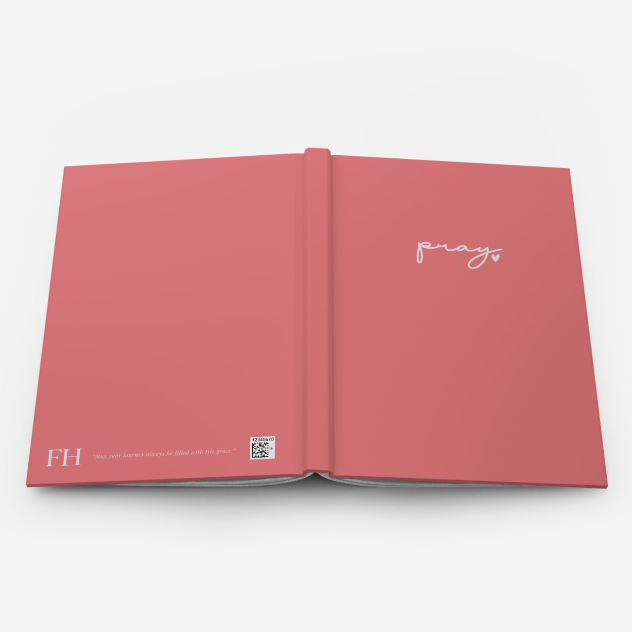 Beautiful pink hardcover faith journal, perfect for prayers and spiritual growth - open to show the back