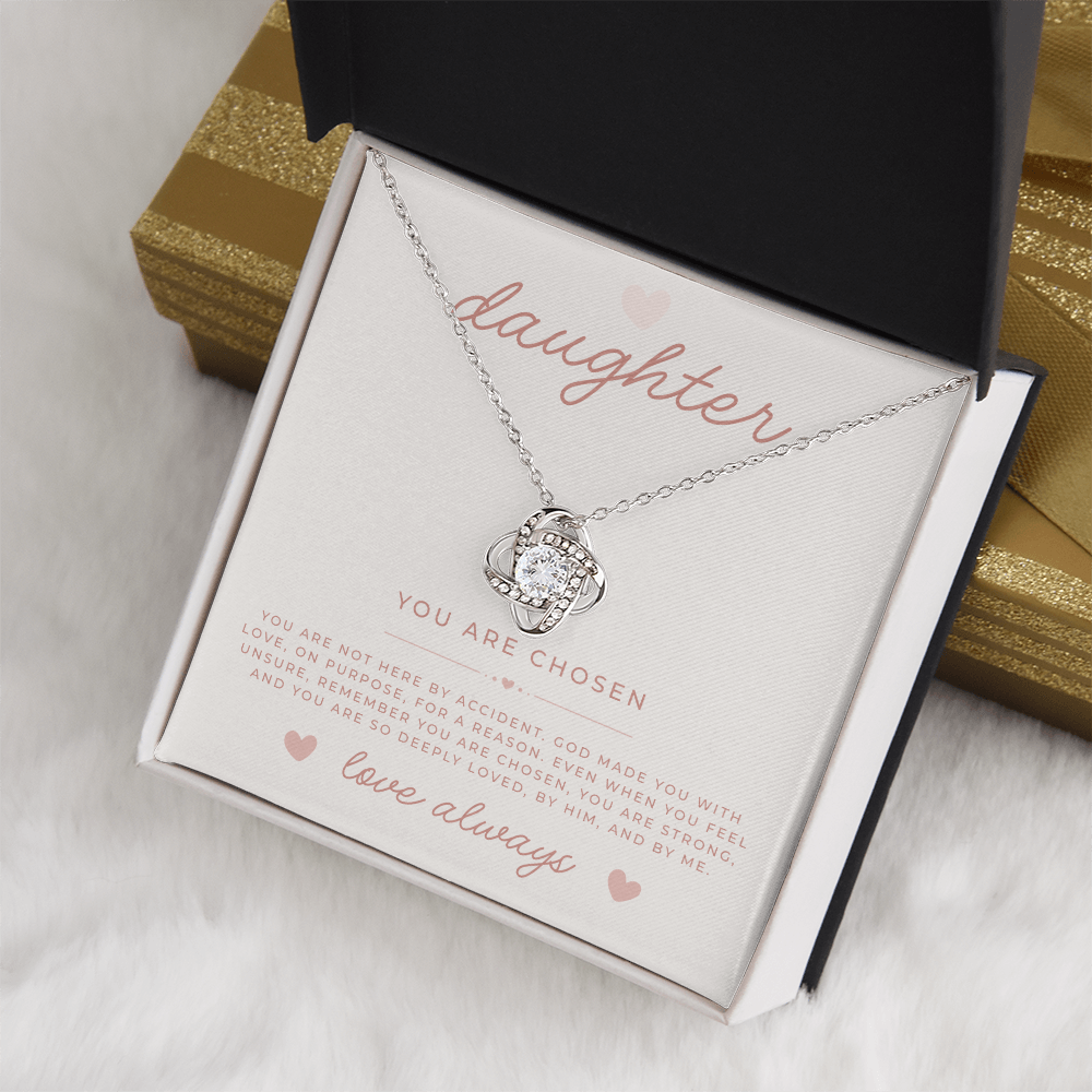 Necklace with white gold love knot pendant with a message card for daughters
