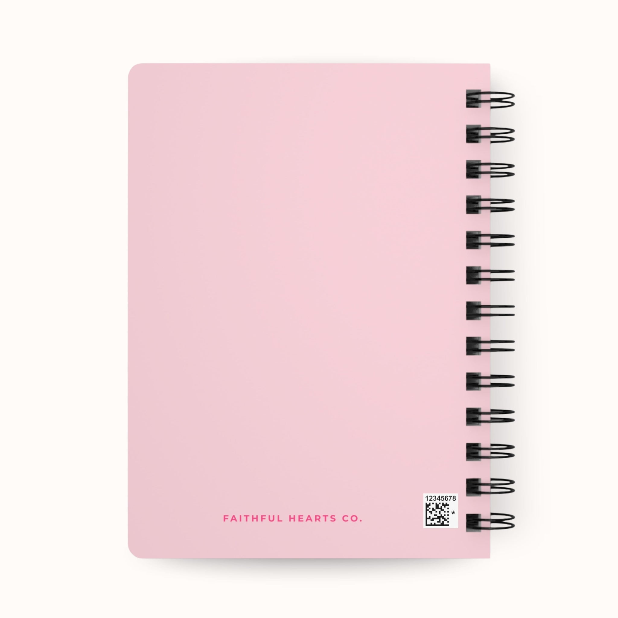 Pink notebook with 'Faithful Hearts Co.' branding on a white background