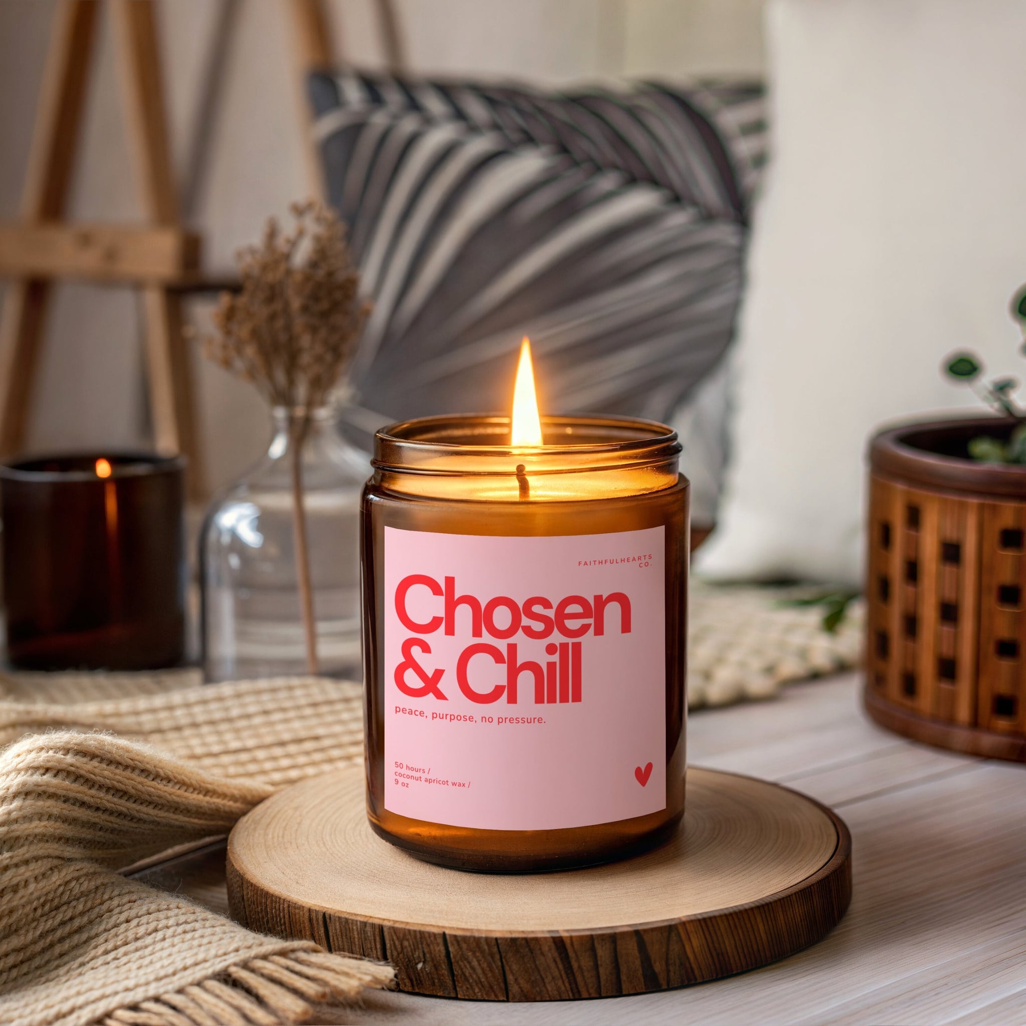 Modern faith-inspired candle, Chosen and Chill in amber jar with blush pink label and red text, artisan coconut apricot wax, gift-ready.