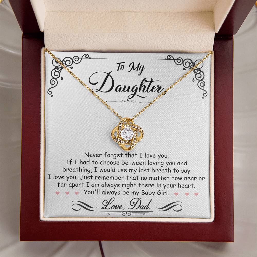 to my daughter necklace, gold love knot pendant inside gift box with message card from dad. 