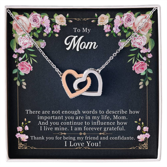 Interlocking hearts necklace with a heartfelt message card for mom.