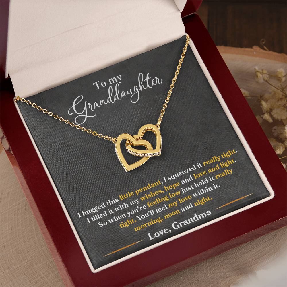 gold interlocking hearts necklace for granddaughter from grandma, with a sweet message inside the luxury gift box.