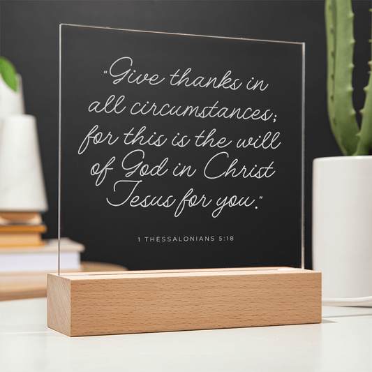 Engraved acrylic plaque with the bible quote "Give thanks in all circumstances; for this is the will of God in Christ Jesus for you."