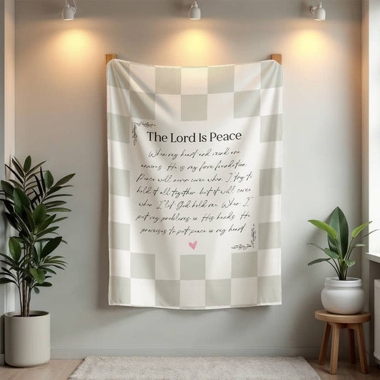 Soft mink fleece blanket with a beautiful light gray checked pattern and scripture writing that says 'The Lord is Peace' and a prayer.