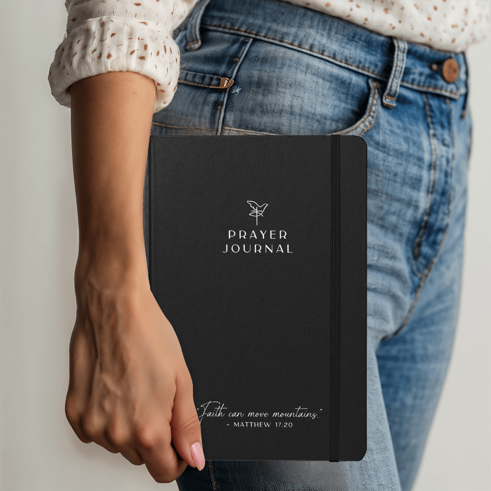 Stylish black Christian journal for prayers, devotionals, and scripture notes.