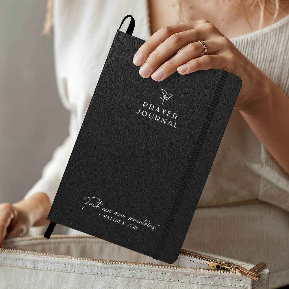Faith based prayer journal in color black with matthew 17:20 bible quote written on the front cover