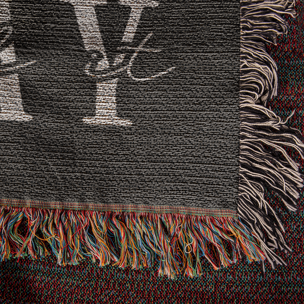 Close-up of a woven blanket featuring an uplifting Christian prayer quote, designed to bring warmth, comfort, and inspiration.