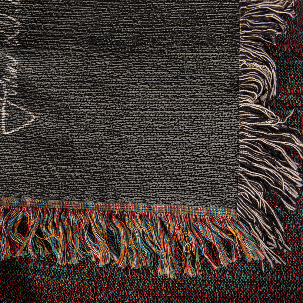 Close-up of soft 100% cotton woven blanket with scripture.