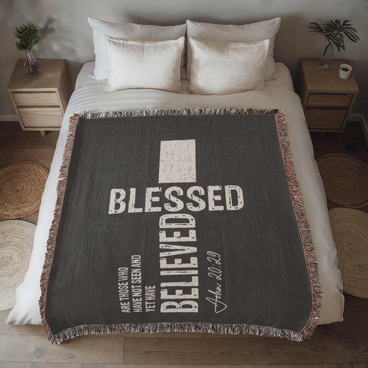 luxury 100% cotton yarn woven blanket with John 20:29 scripture, finished with delicate fringe edges in dark gray and cream.