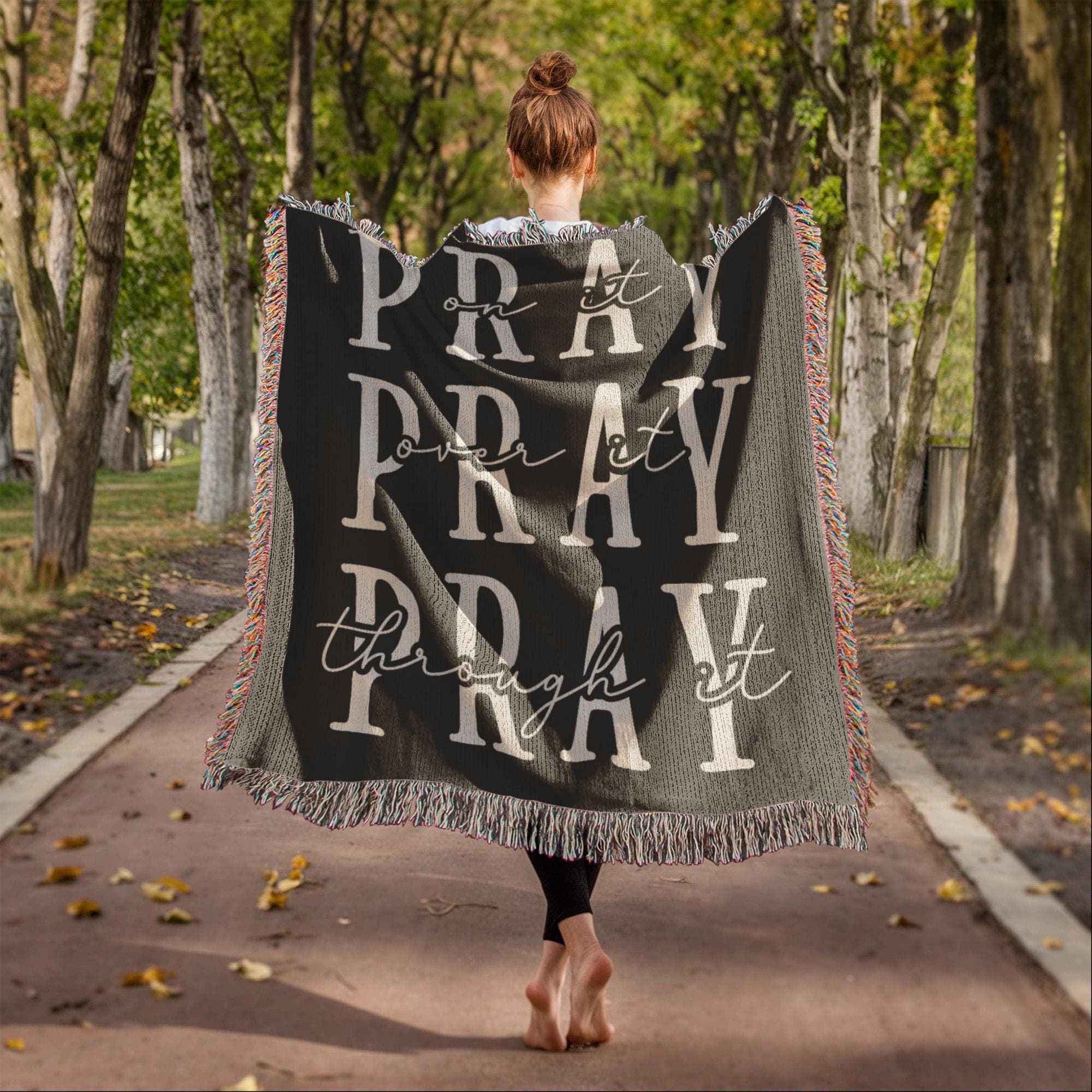 A high-quality woven blanket with a meaningful prayer quote.