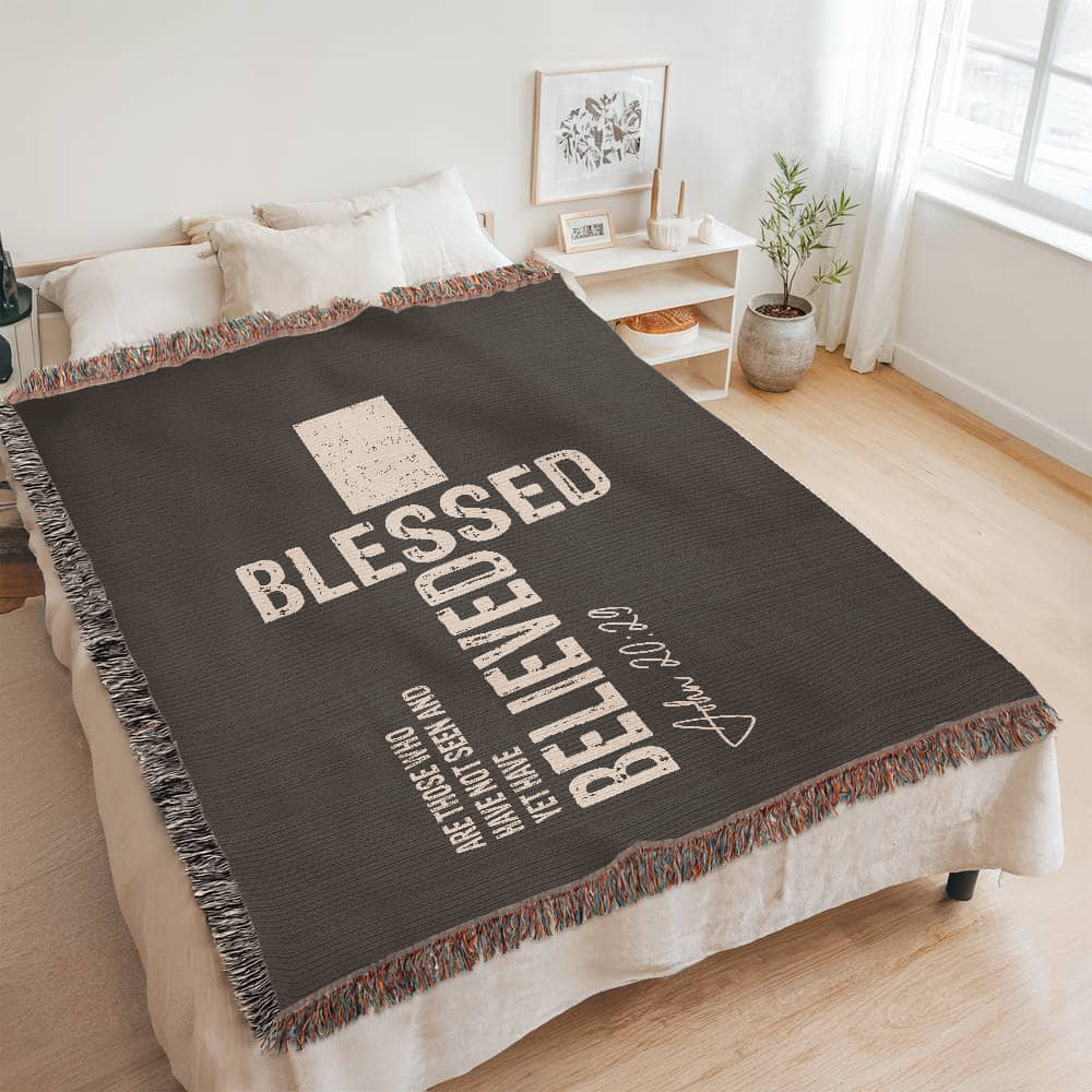 Beautifully displayed woven blanket on a bed, bringing comfort, faith, and inspiration to any space.