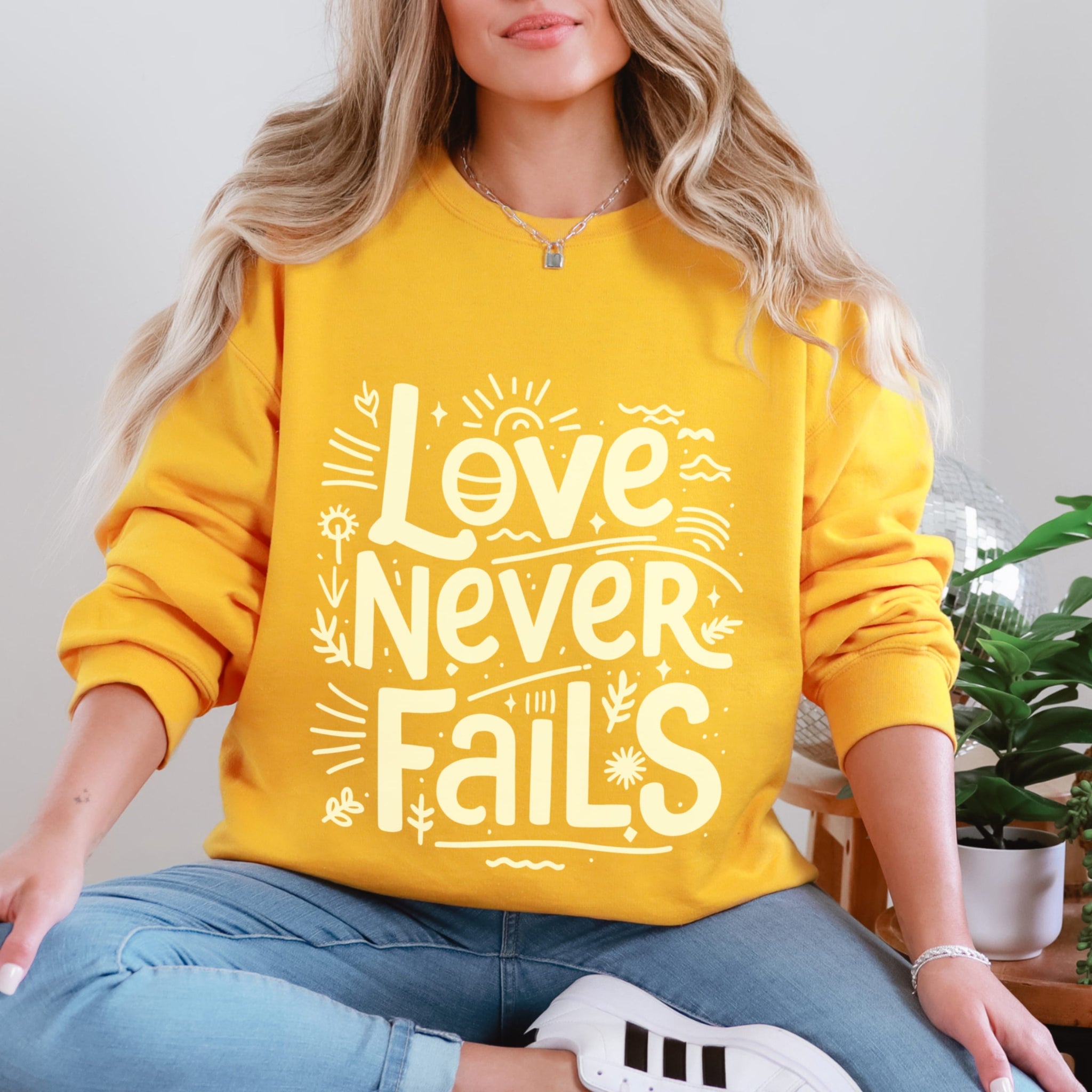 Love Never Fails Sweatshirt Yellow | 1 Corinthians 13:8 Crewneck