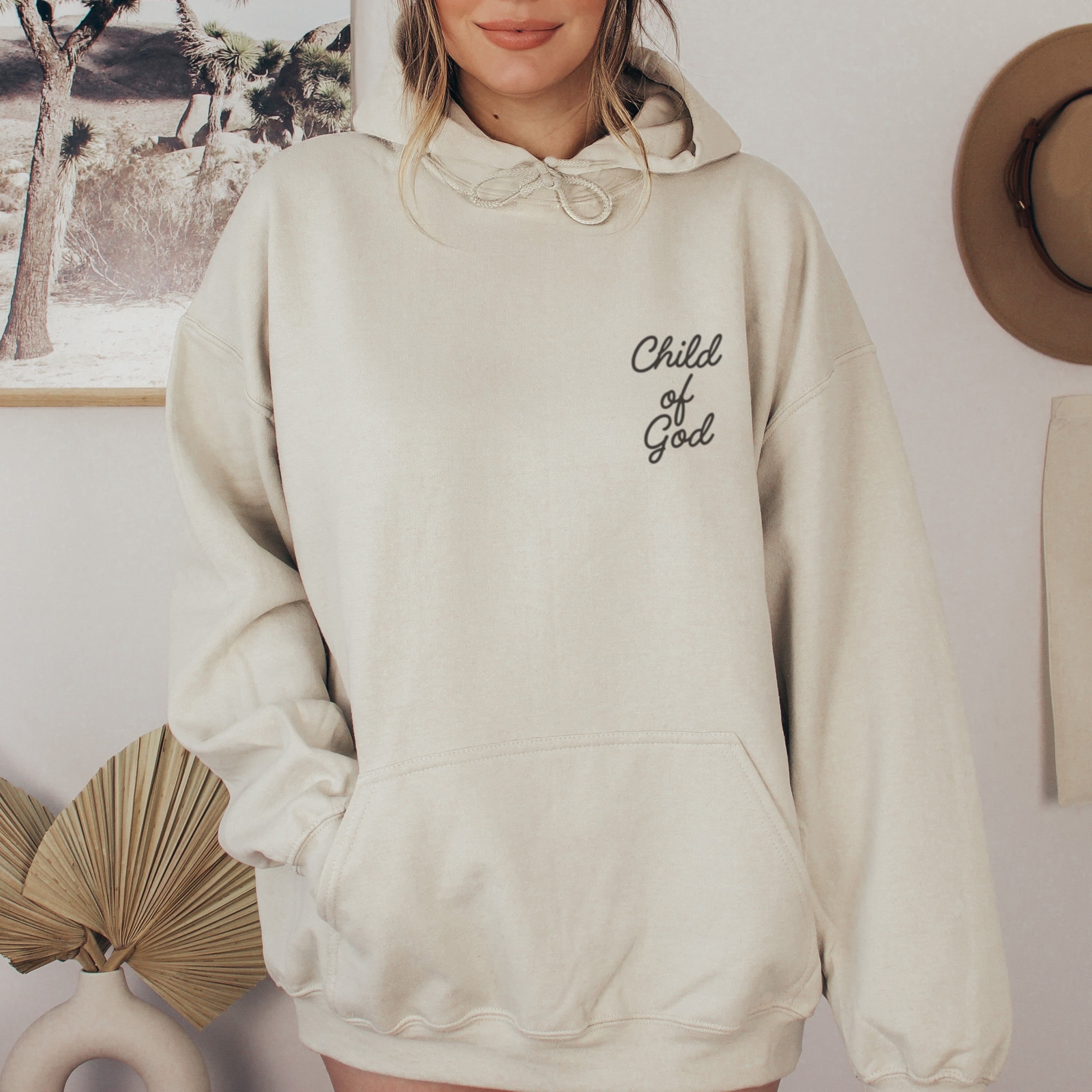 Sand colored Christian hoodie with child of God quote on the front for women