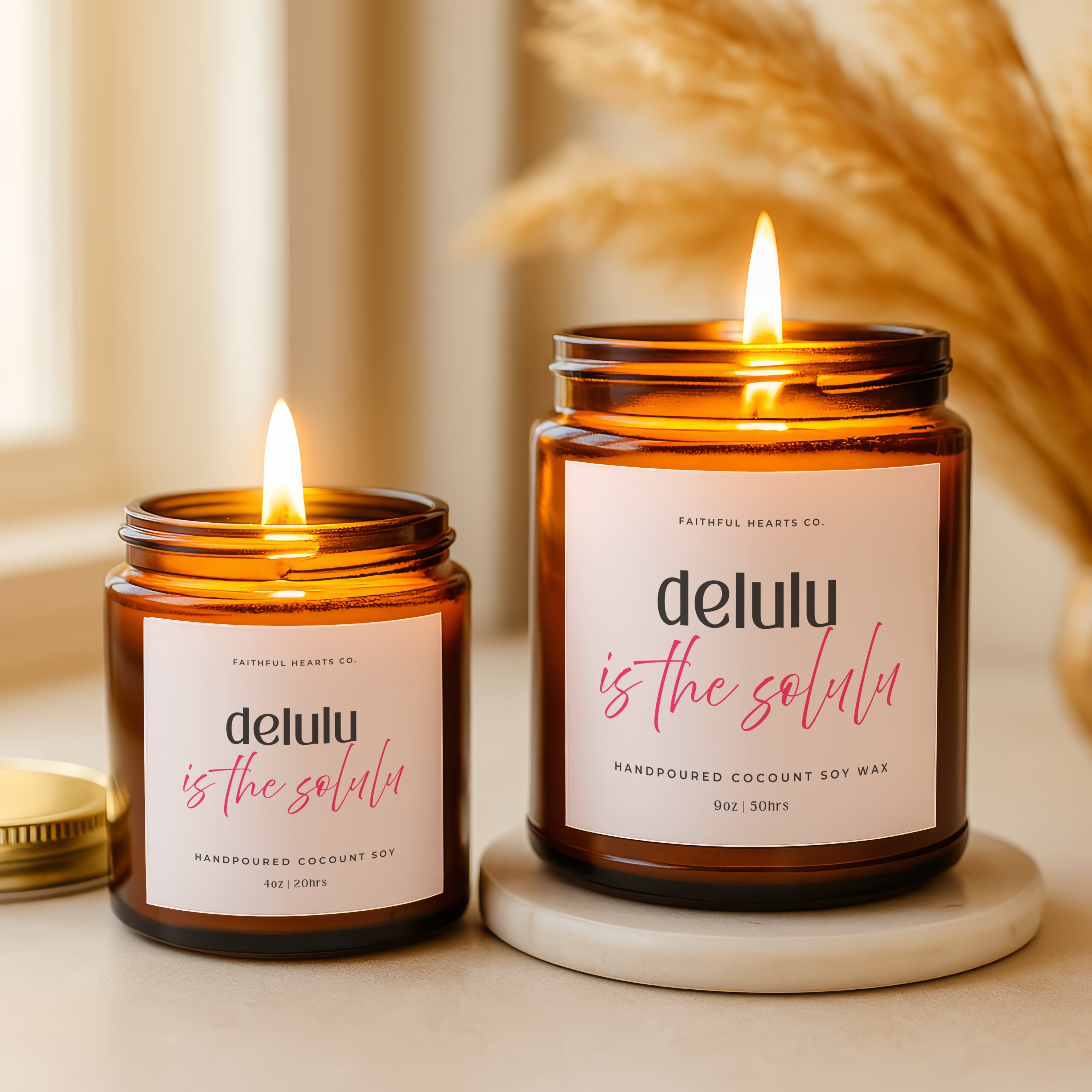 Manifesting candle in amber jar reading “Delulu is the Solulu,” playful spiritual candle for women into self love, alignment, and abundance mindset.