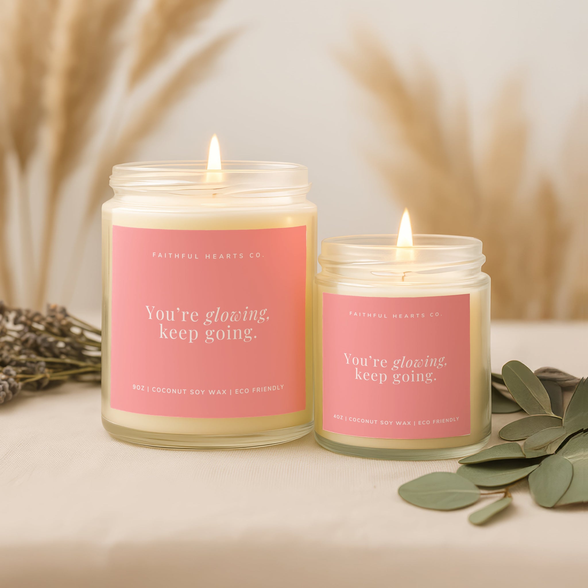 You're glowing keep going faith candle with pink coral label