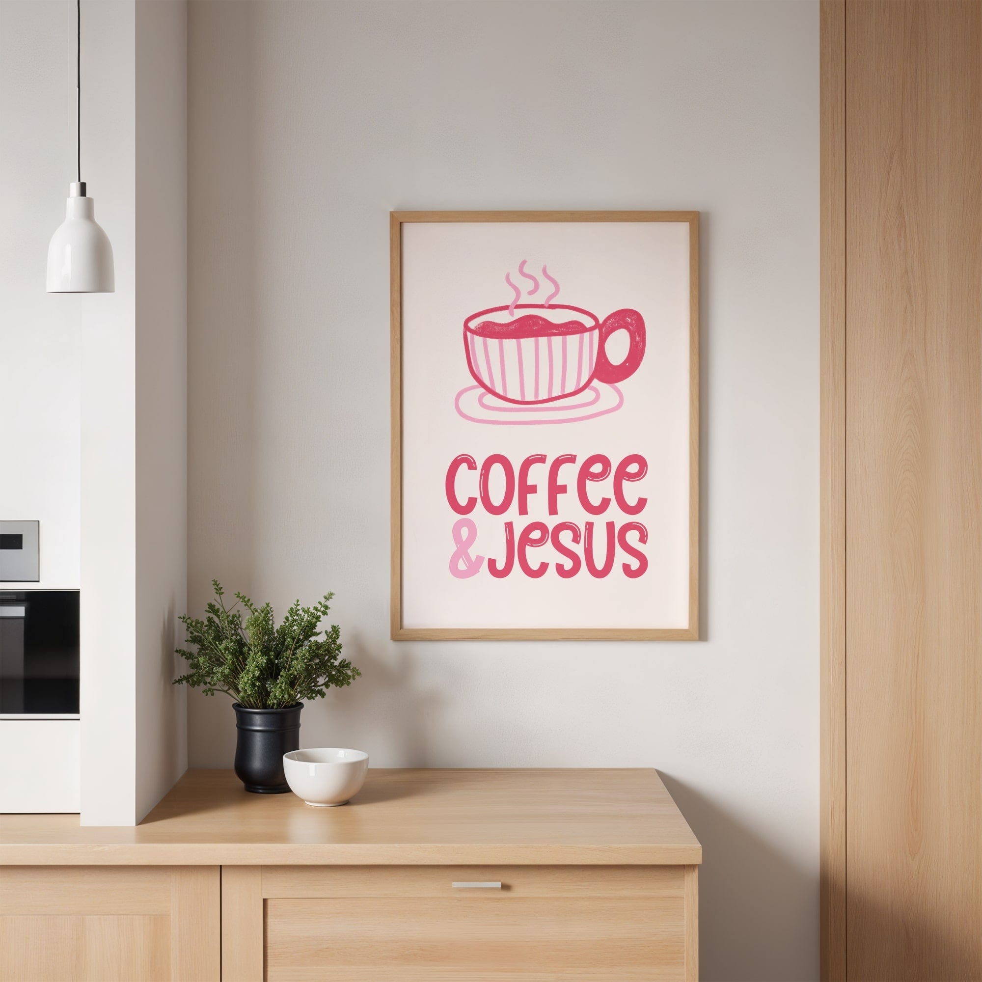 Framed artwork with 'Coffee & Jesus' text in a kitchen setting