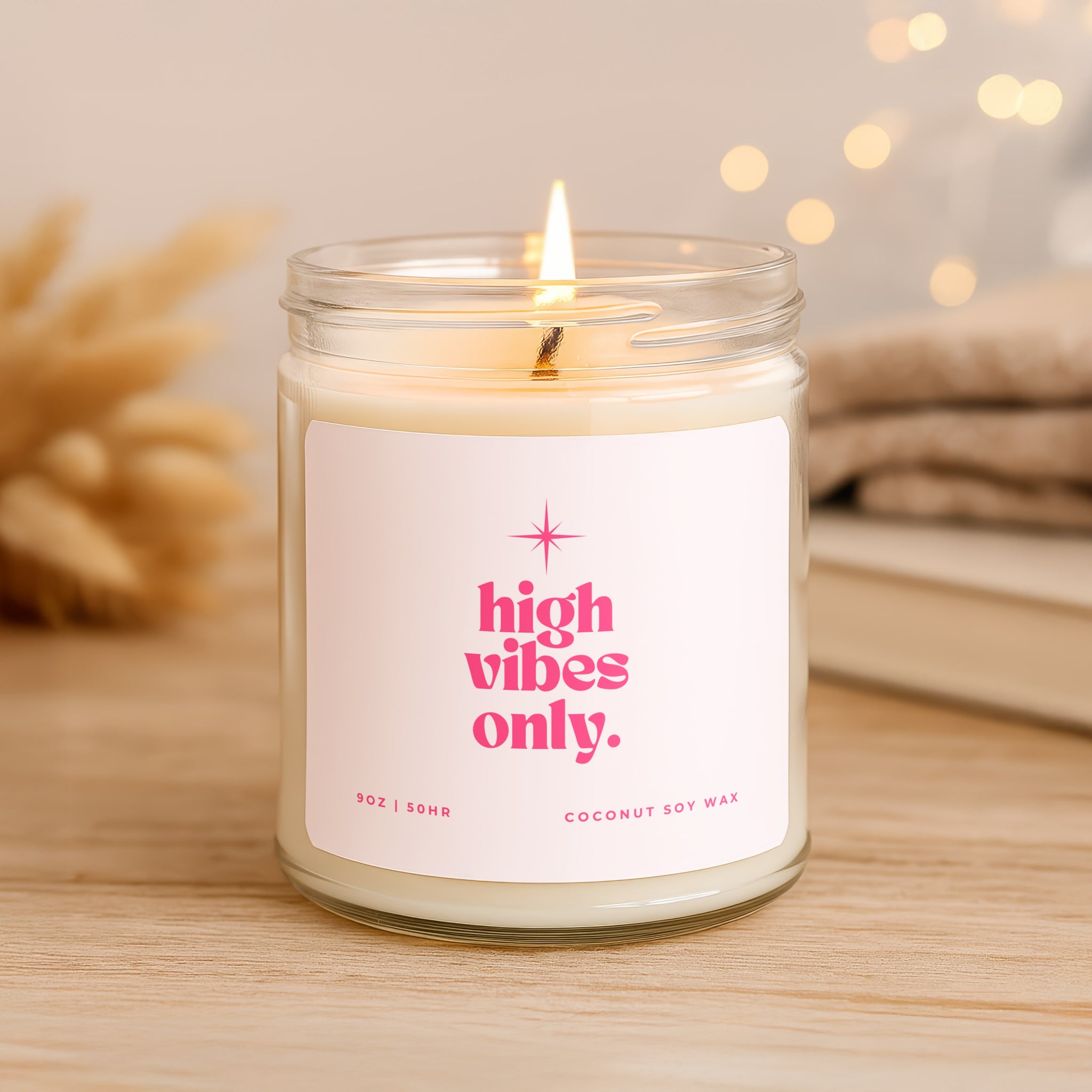 Clear glass High Vibes Only candle with bold pink label, uplifting positivity candle gift for her — perfect spiritual home fragrance and manifestation candle for women.