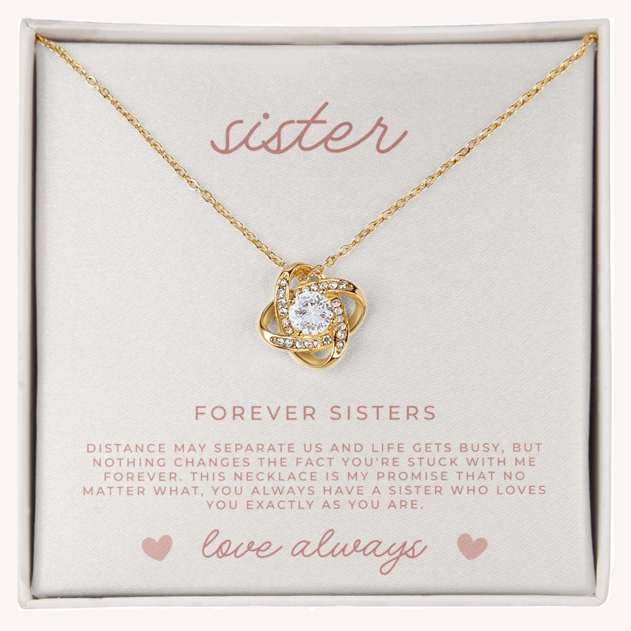 Waterproof gold love knot necklace in gift box with faith-filled “To My Sister” message card, perfect sentimental gift