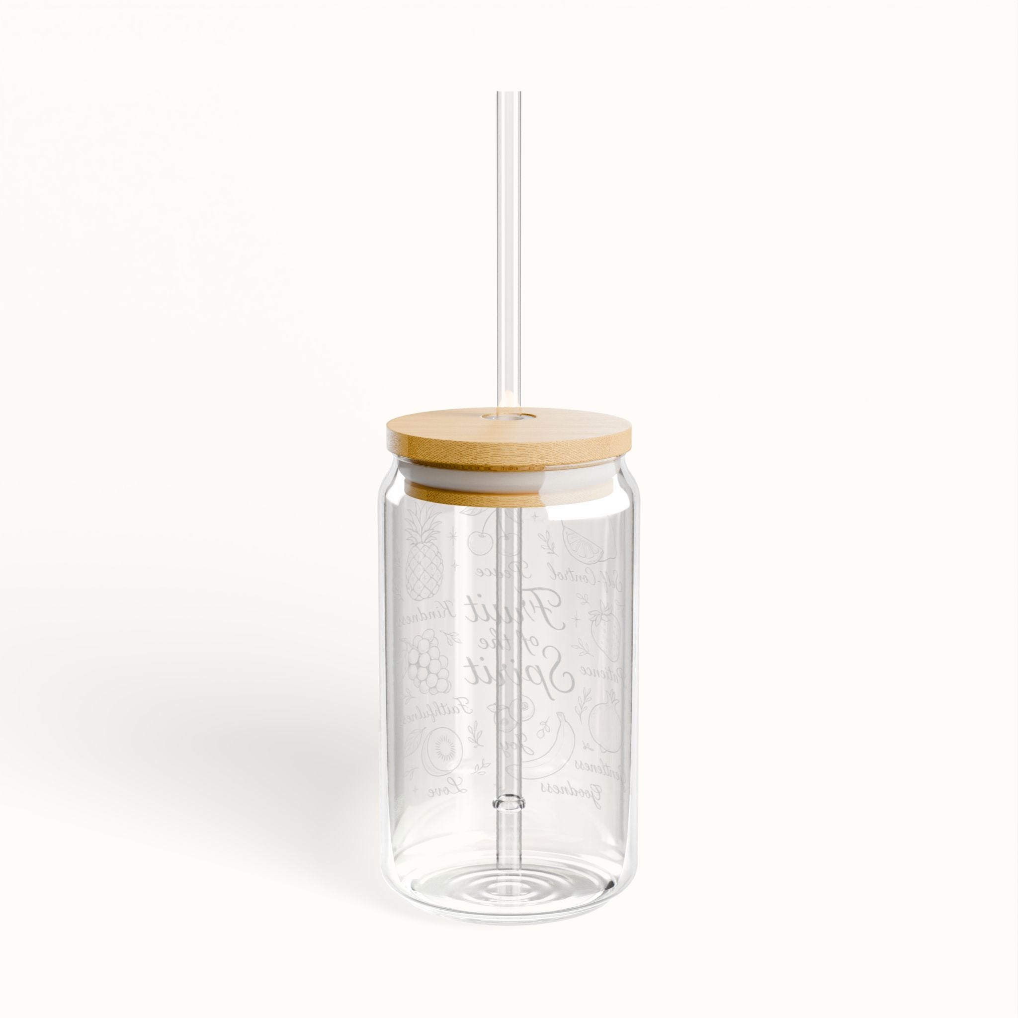 Clear glass tumbler with a wooden lid and straw with fruit of the spirit on the front