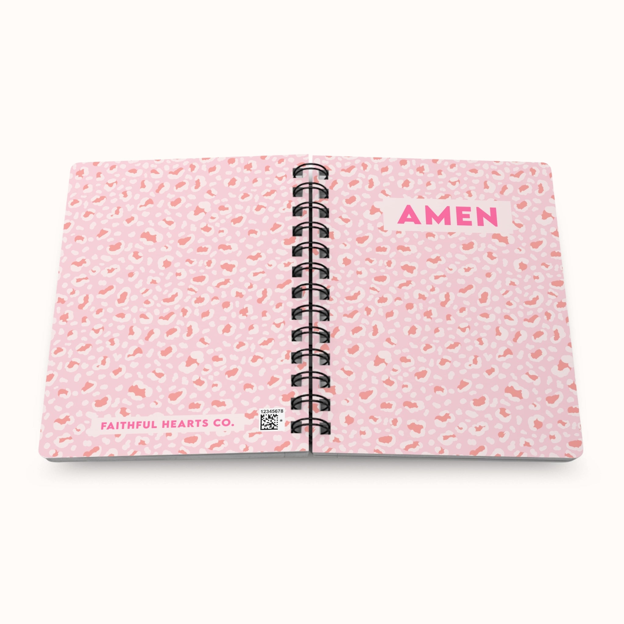 Pink leopard print spiral notebook open showing both front and back