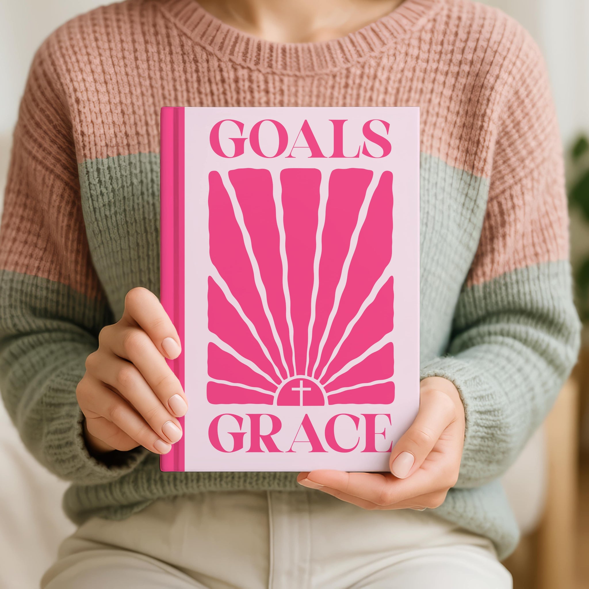 Soft blush pink hardback journal with hot pink lettering and minimalist sun illustration