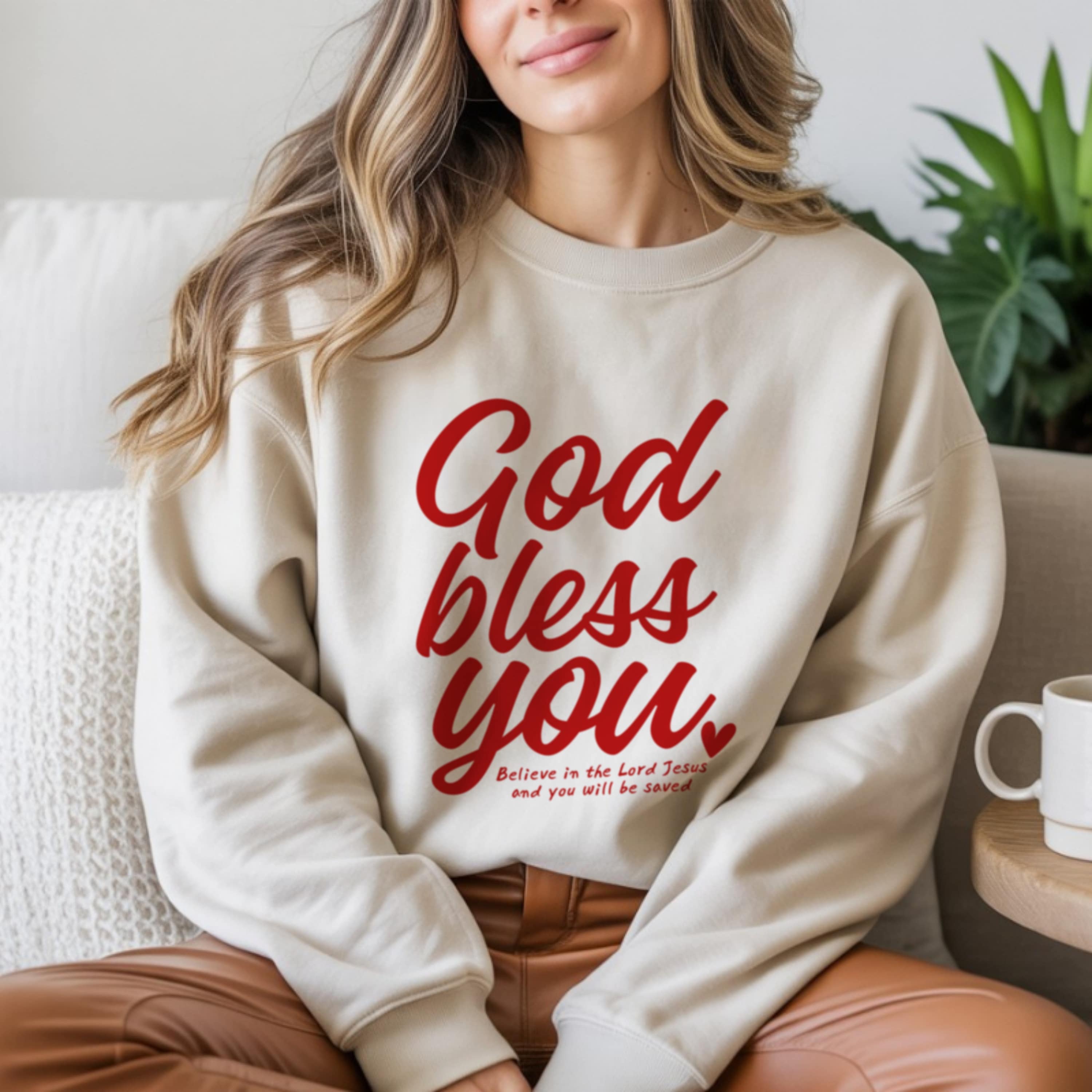 God Bless You sweatshirt in white with red script and Acts 16:31 scripture, Christian faith crewneck for women