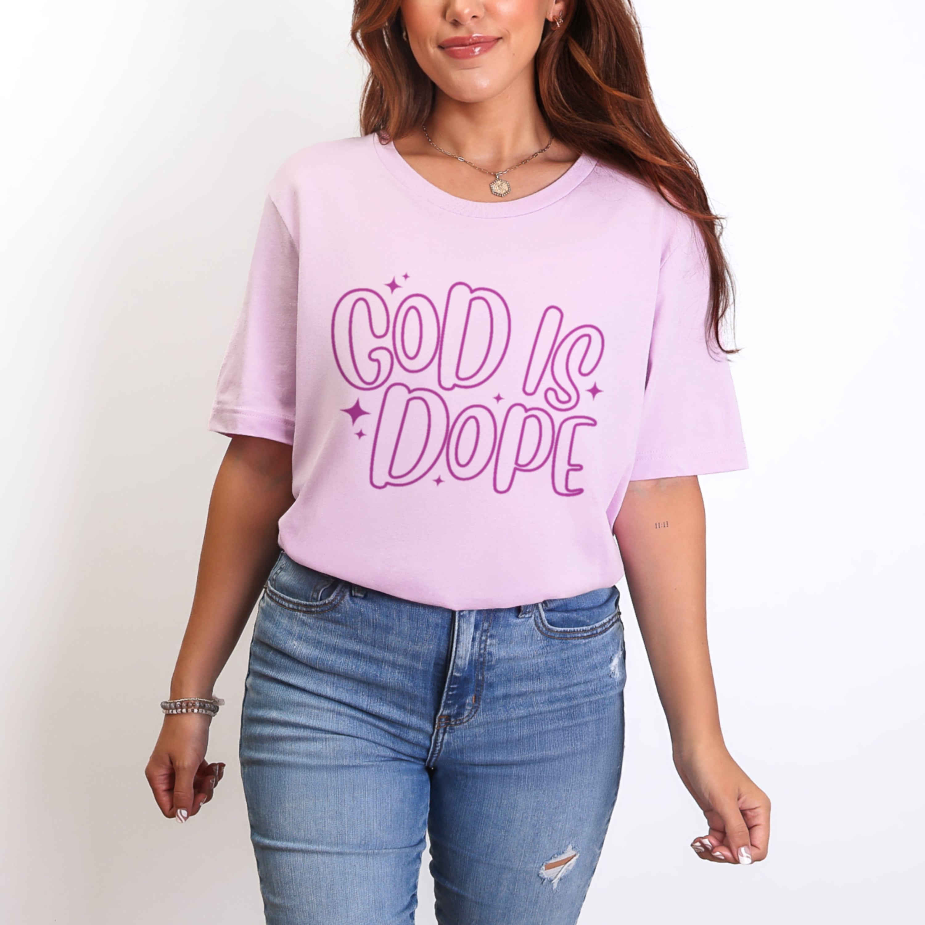 Woman wearing soft lilac God Is Dope tshirt with purple bubble lettering, trendy Christian graphic tee for women