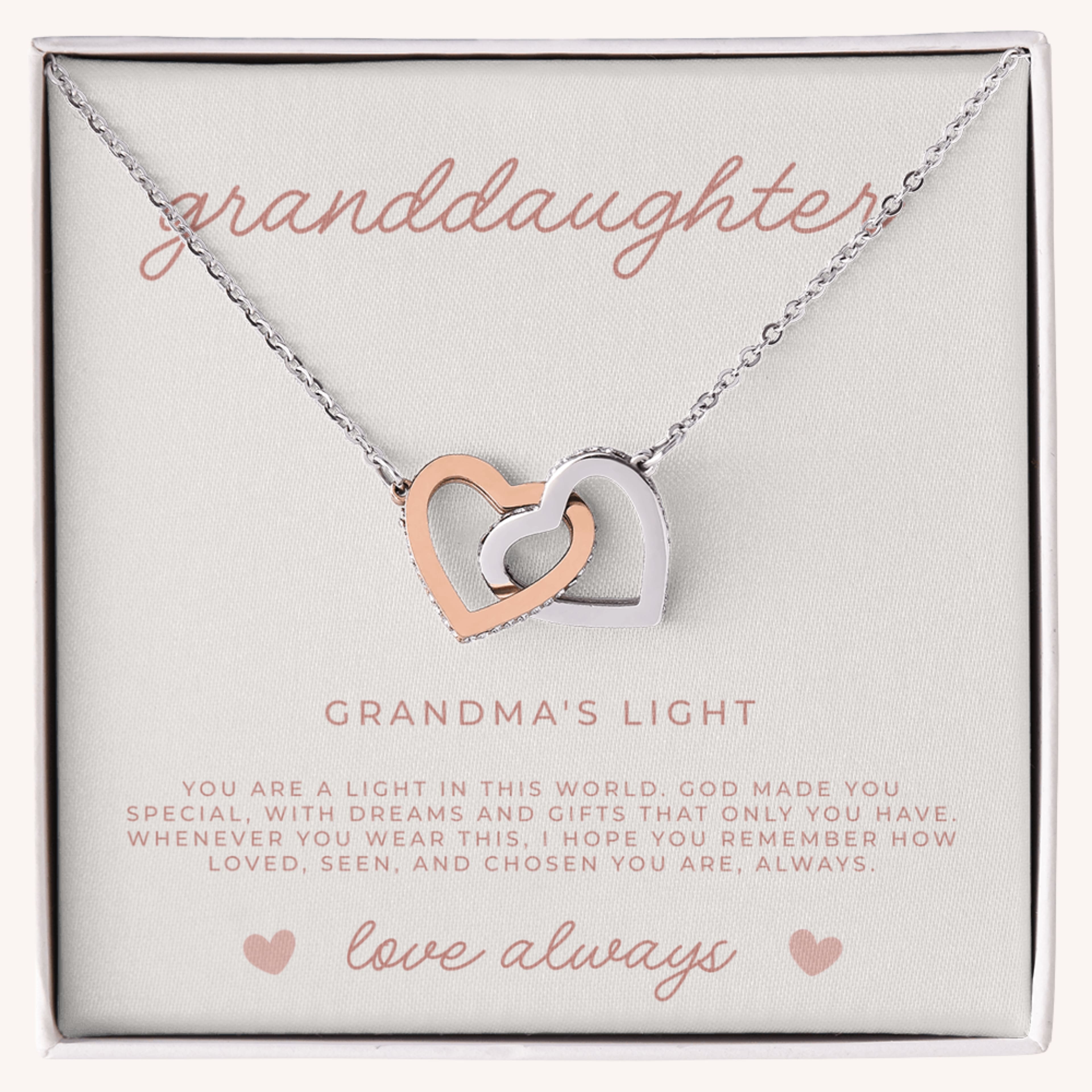 Necklace with interlocking heart pendants with a message card that reads 'granddaughter, grandma's light', faith based gift