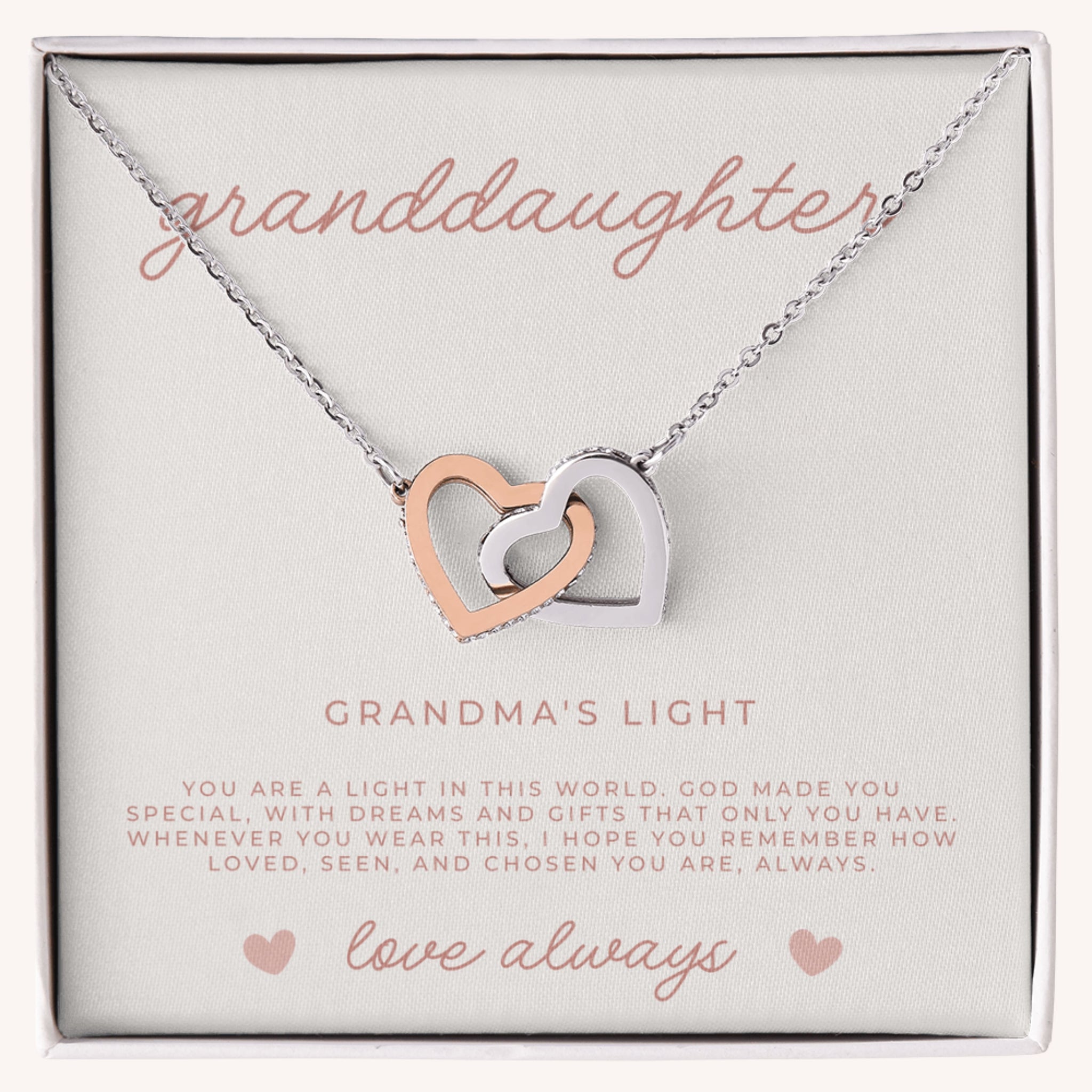 Necklace with interlocking heart pendants with a message card that reads 'granddaughter, grandma's light', faith based gift