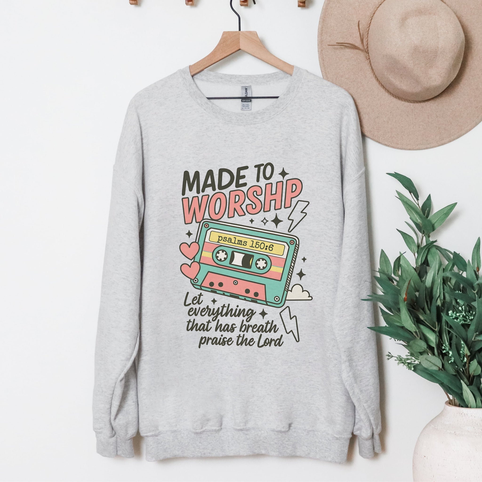 Made To Worship ash grey sweatshirt with retro cassette tape design - playful Christian Psalm 150:6 apparel