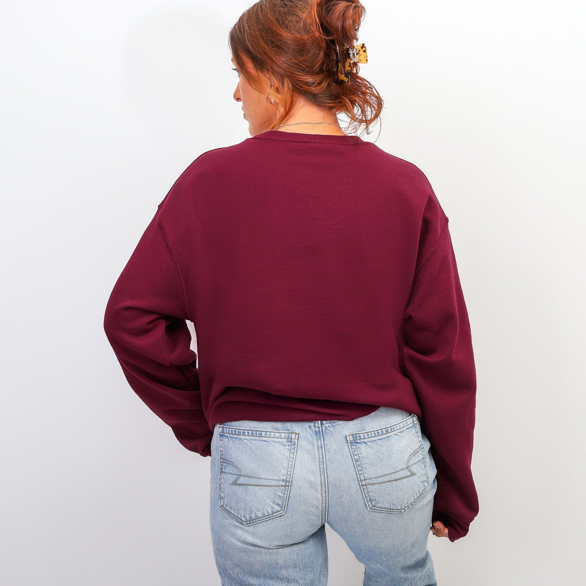 Back view of maroon Hope Psalm 130:5 sweatshirt - oversized burgundy Christian crewneck for women