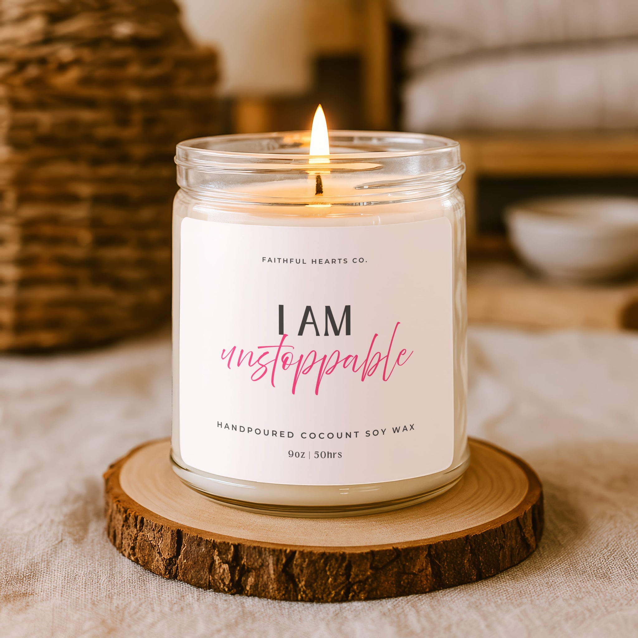 Affirmation Candle Gift in clear glass jar reading I AM Unstoppable, inspirational wellness candle for spiritual women and mindset growth.