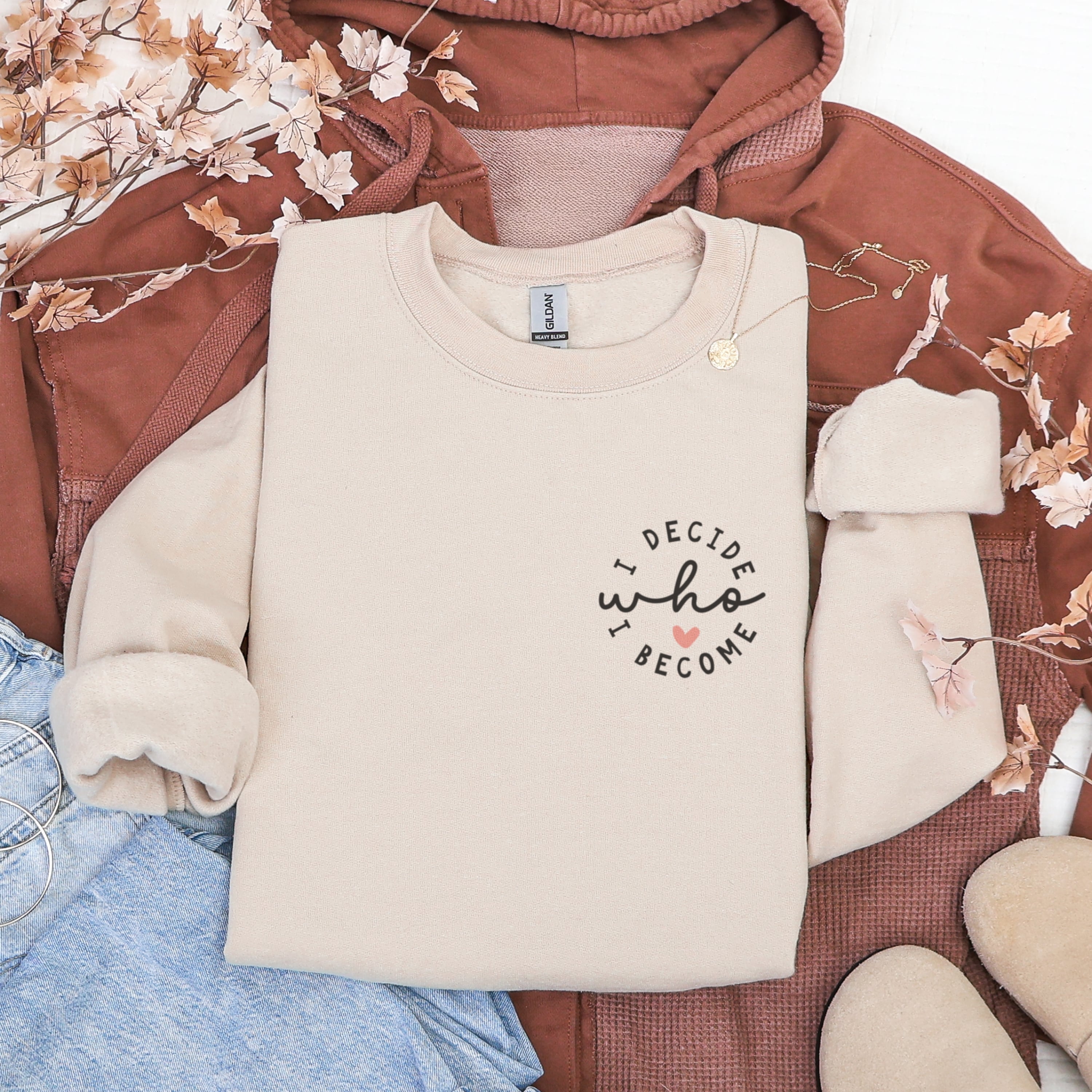 Beige I Decide Who I Become sweatshirt flat lay showing chest print - minimalist empowerment apparel for women