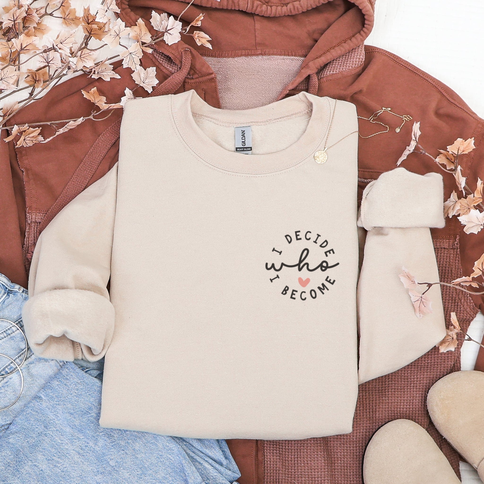 Beige I Decide Who I Become sweatshirt flat lay showing chest print - minimalist empowerment apparel for women