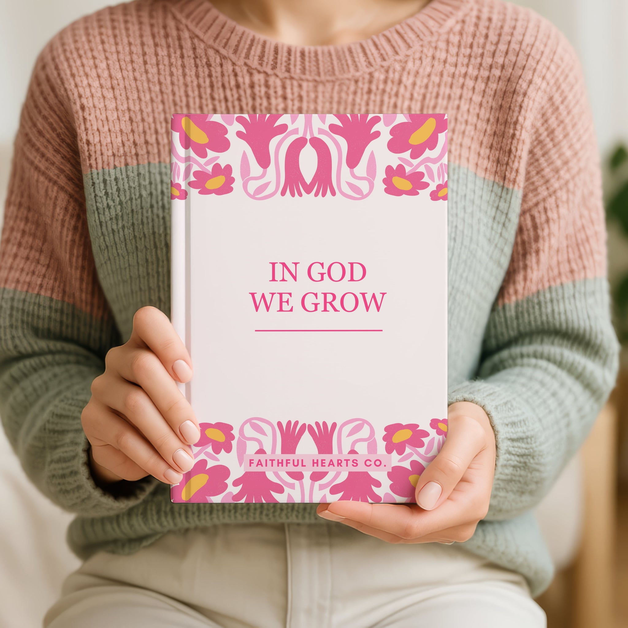 Cream hardback notebook with vibrant floral border design in hot pink and coral, 